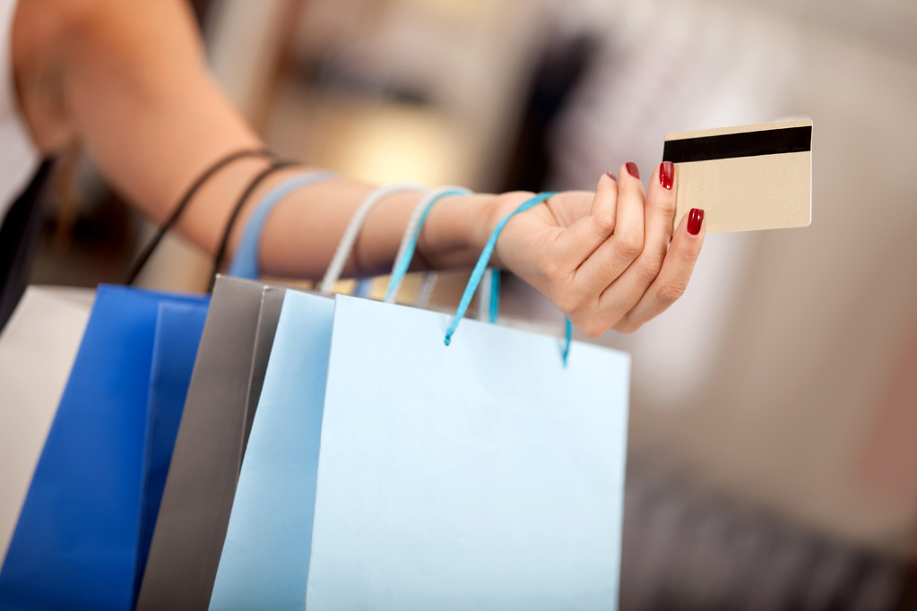 woman-with-shopping-bags-and-credit-card.jpg
